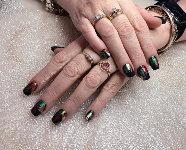 Short square nails in emerald, burgundy and gold foil